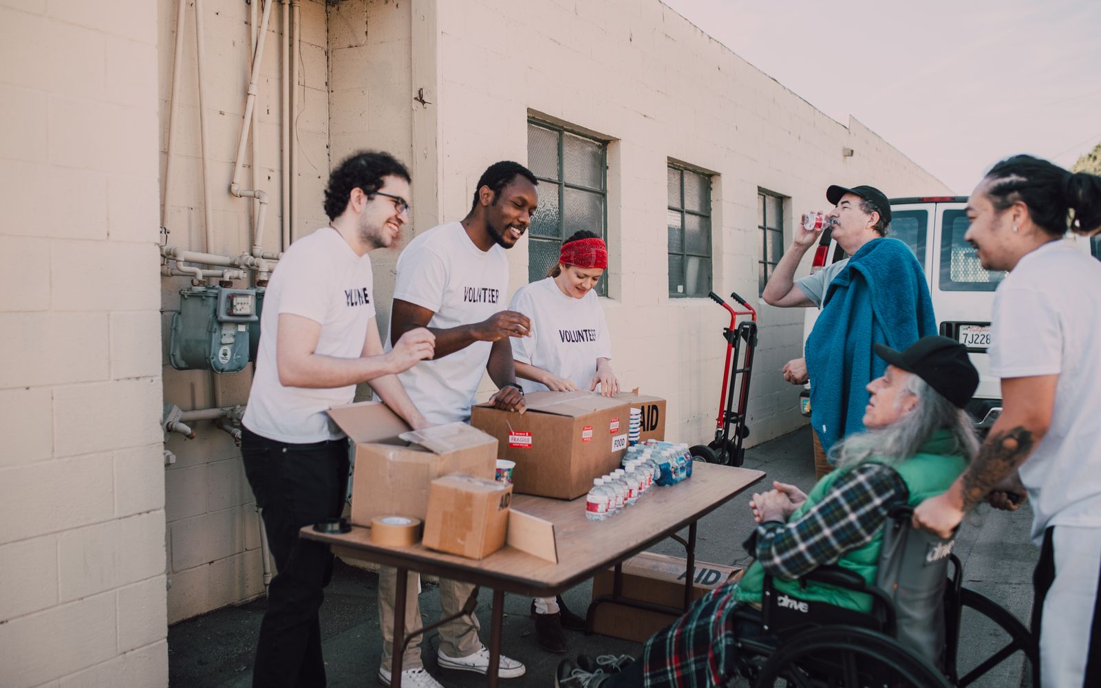 Volunteers and neighbors at an Uplift community center